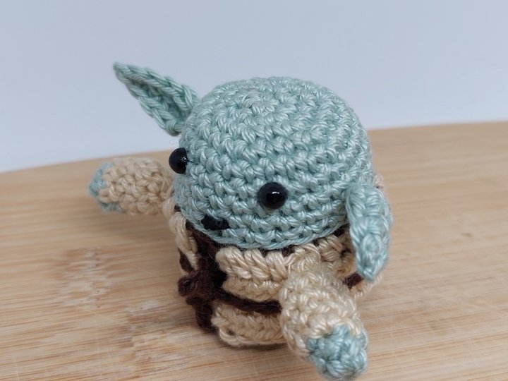 Anleitung zum Häkeln eines mächtigen Zauberers aus einer anderen Glaxie