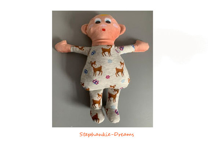 Babys first cuddly doll