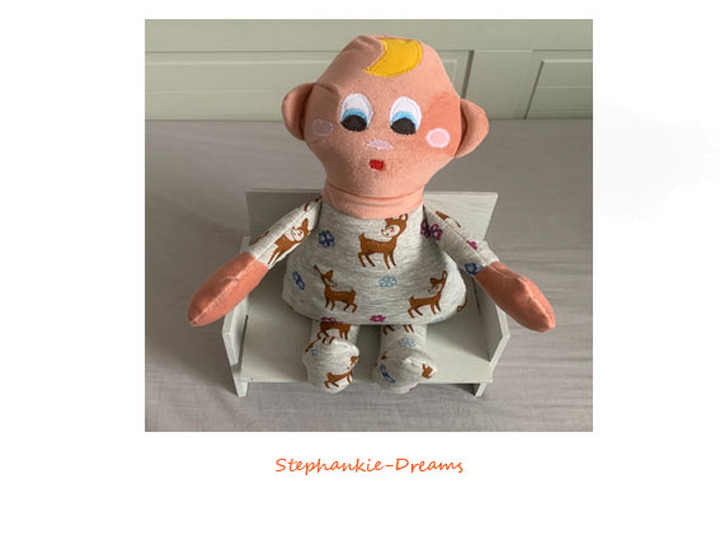 Babys first cuddly doll