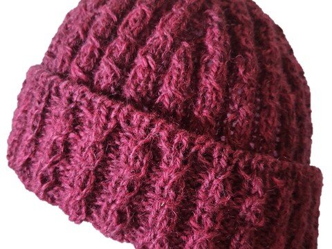 Einfache Zopfmütze von oben gestrickt