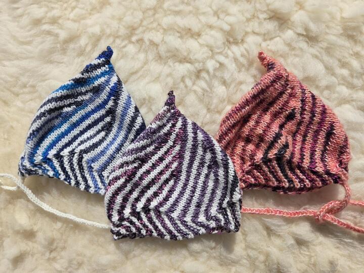 Baby-Wirbelmütze , Strickanleitung