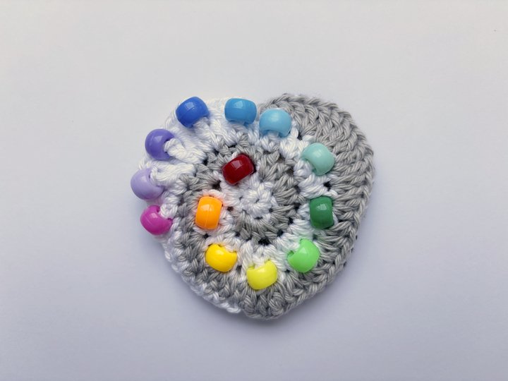 Spiralherz Fidget Spielzeug, Herz m. Perlen, Klick Klack Sensorik Spielzeug