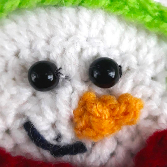 Christmas Crochet Snowman Pattern in Red Scarf and Headphones