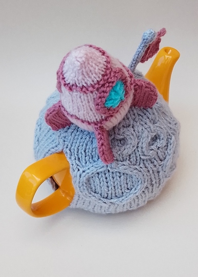 TeaCosyFolk's Cosmic Cuppa Woman on the Moon Tea Cosy and Knitting Pattern